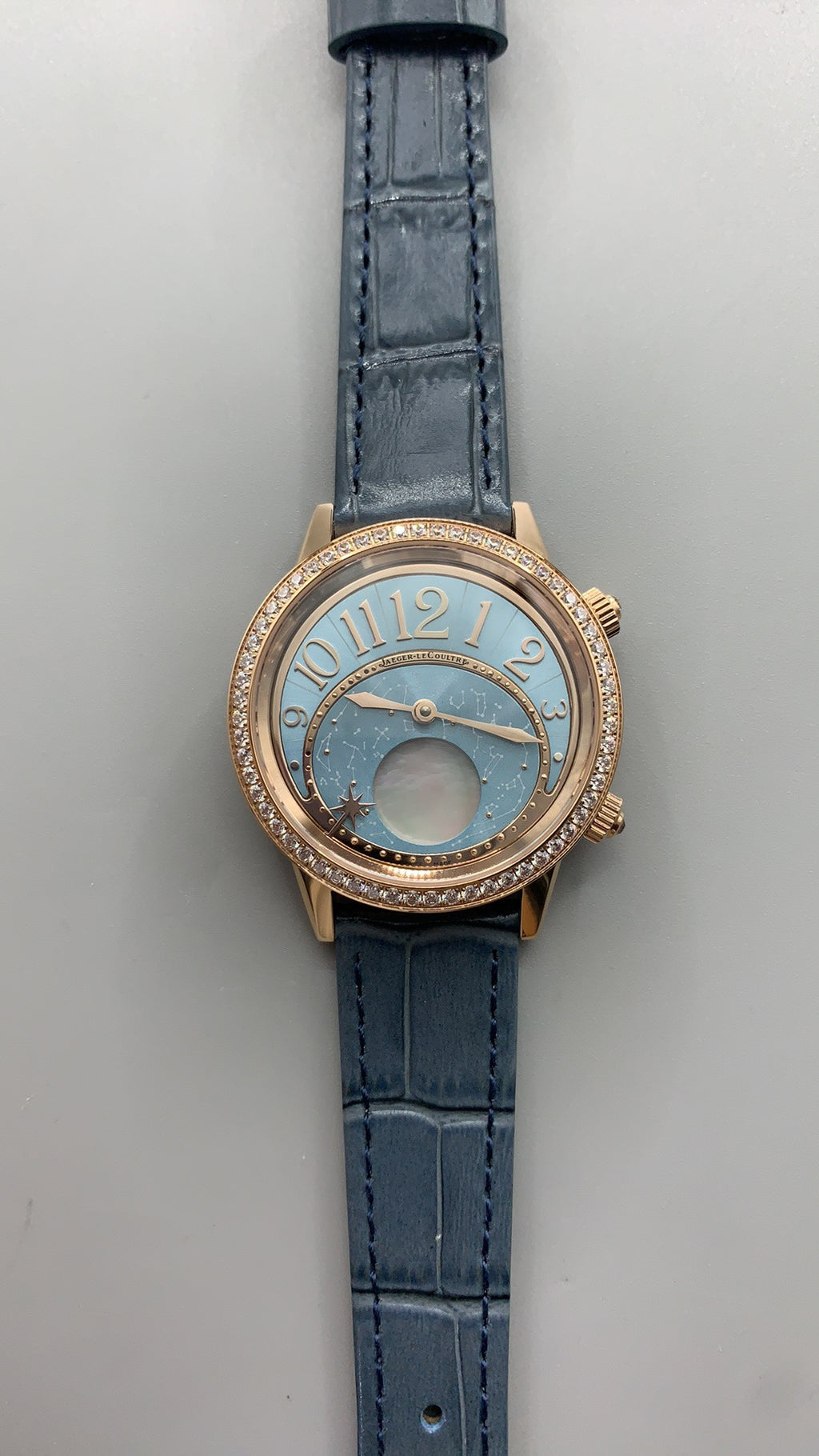 Jaeger-LeCoultre Rendez-Vous Star | 36MM | Rose gold-plated stainless steel case | Diamond-set bezel | Falling star function | Blue dial | Blue alligator strap | Automatic movement Cal.734