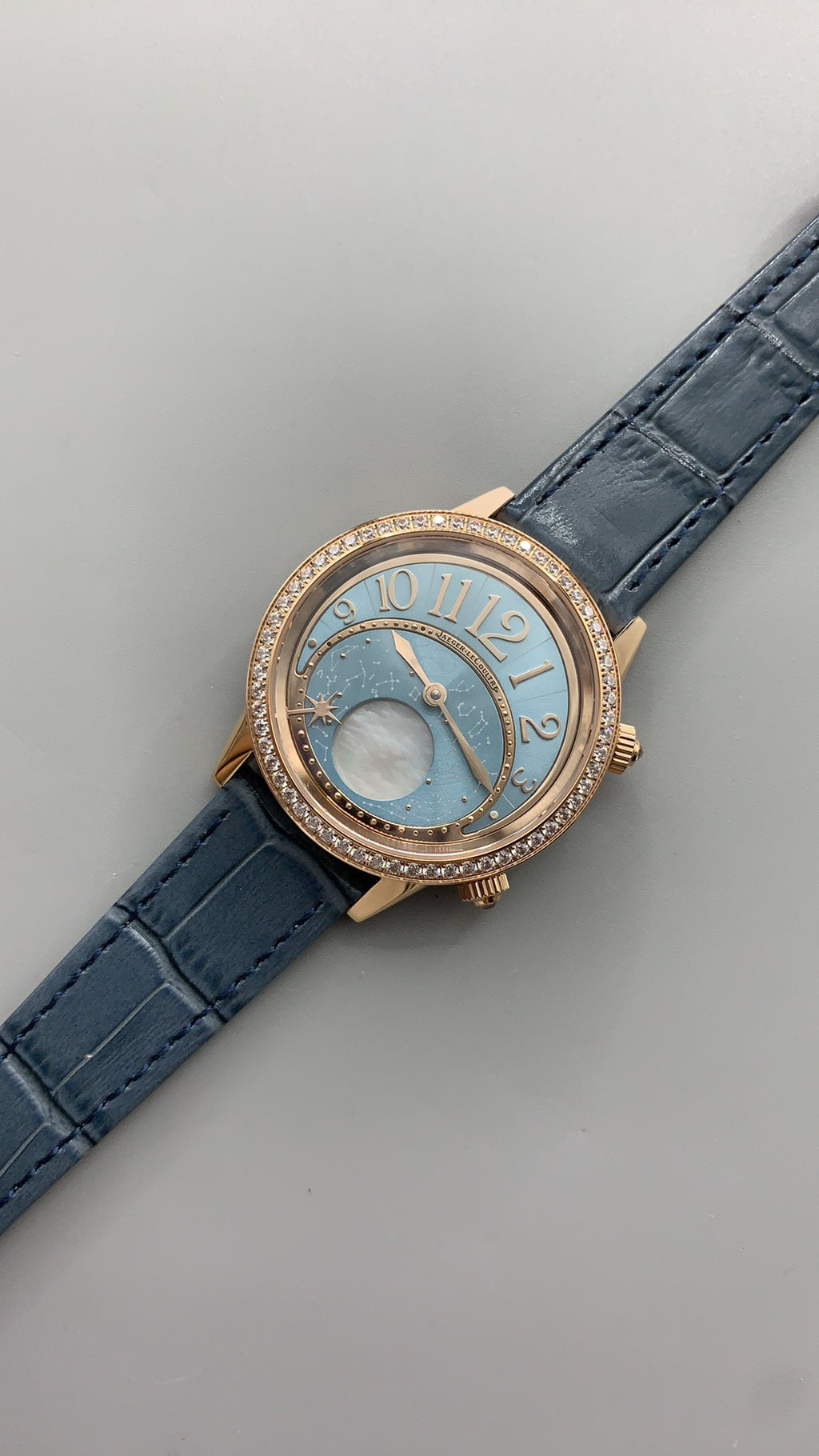 Jaeger-LeCoultre Rendez-Vous Star | 36MM | Rose gold-plated stainless steel case | Diamond-set bezel | Falling star function | Blue dial | Blue alligator strap | Automatic movement Cal.734