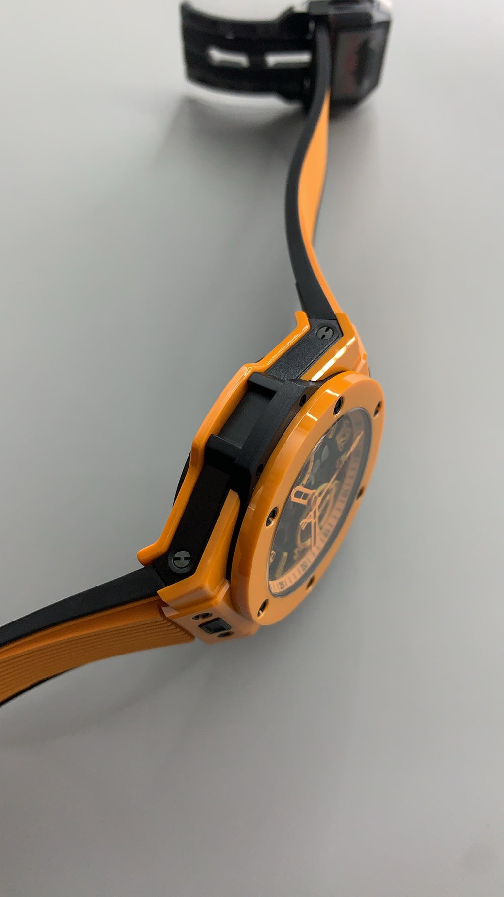 Hublot Big Bang Chronograph | 44MM | ตัวเรือนไทเทเนียม | ขอบเซรามิกสีส้ม | หน้าปัดสเกเลตัน | จับเวลา Chronograph | กลไกอัตโนมัติ HUB4100