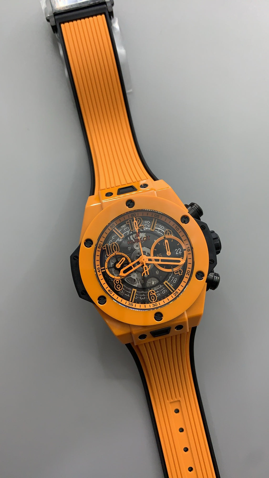 Hublot Big Bang Chronograph | 44MM | ตัวเรือนไทเทเนียม | ขอบเซรามิกสีส้ม | หน้าปัดสเกเลตัน | จับเวลา Chronograph | กลไกอัตโนมัติ HUB4100