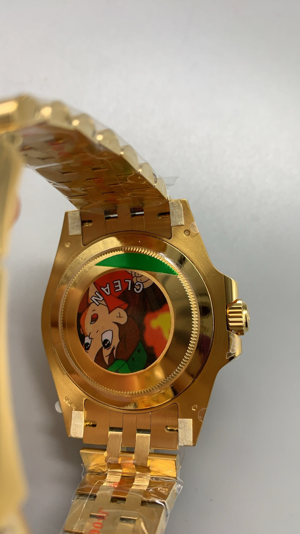 Rolex GMT-Master II 40MM | ขอบเซรามิกสีดำ-เทา (ขอบไข่เยี่ยวม้า) | ตัวเรือนสแตนเลสเคลือบสีทอง PVD | กลไกอัตโนมัติ Cal.3285