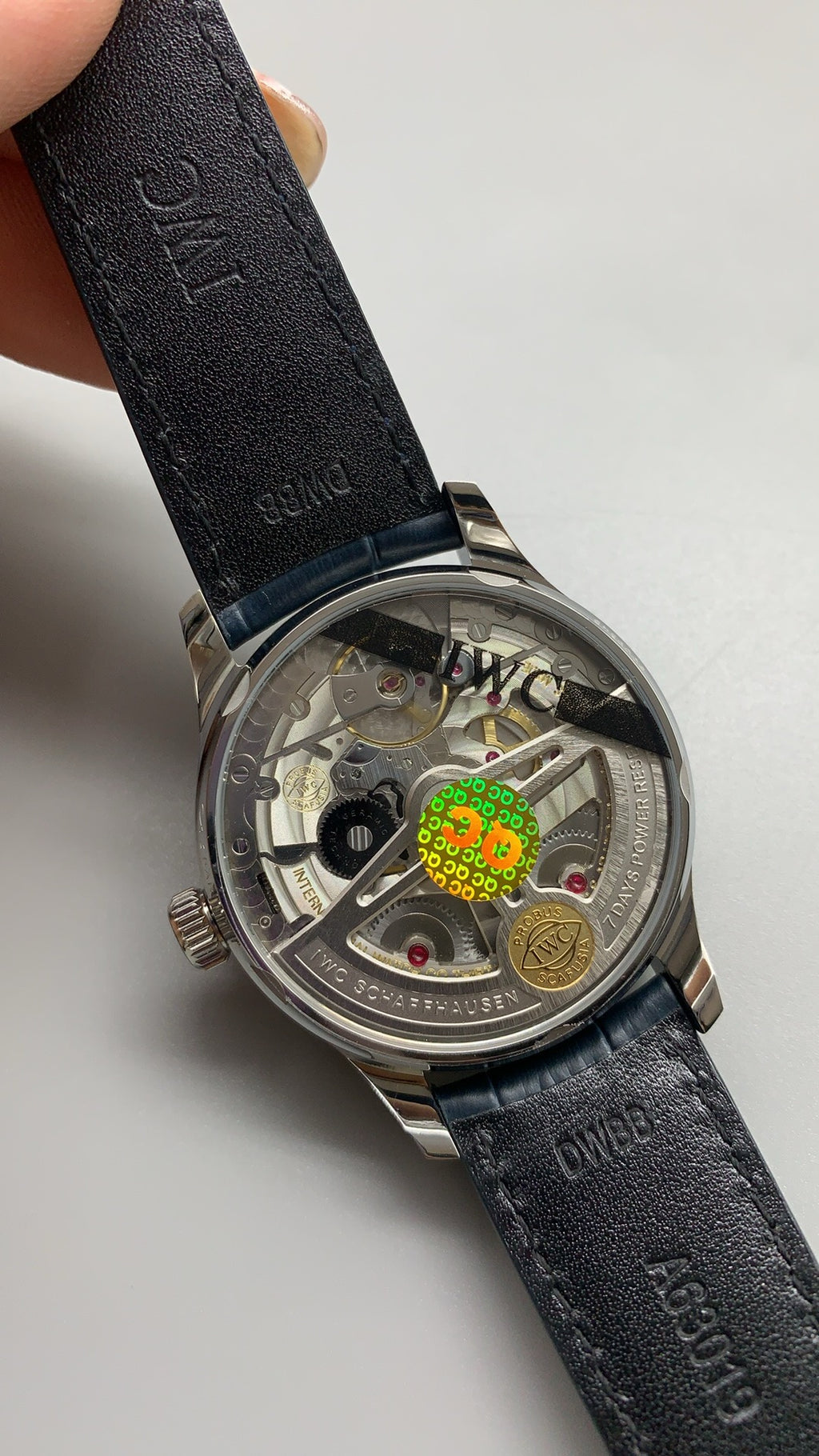 IWC Portugieser Automatic IW500705 | 42.3MM | ตัวเรือนสเตนเลสสตีล | หน้าปัดสีขาว | เข็มสีน้ำเงิน | สายหนังจระเข้สีน้ำเงิน | กลไกอัตโนมัติ Cal.52010