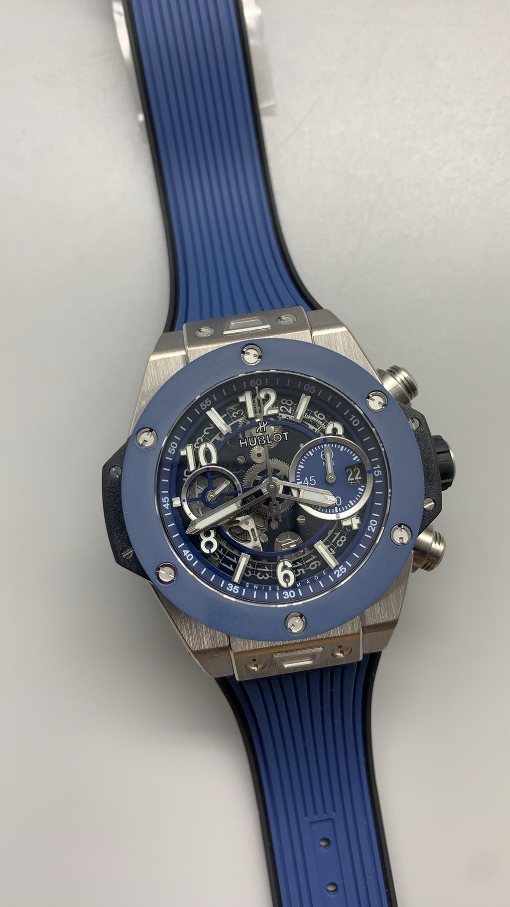 Hublot Big Bang Chronograph | 44MM | ตัวเรือนสแตนเลสสตีล | ขอบเซรามิกสีน้ำเงิน | หน้าปัดสเกเลตัน | จับเวลา Chronograph | กลไกอัตโนมัติ HUB4100