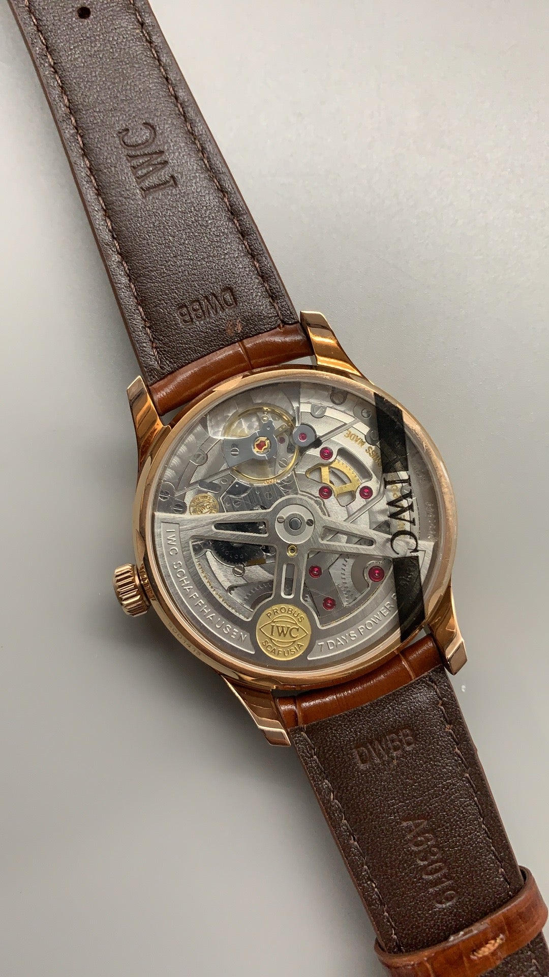 IWC Portugieser Automatic 7 Days | 42.3MM | ตัวเรือนโทนโรสโกลด์ | พลังงานสำรอง 7 วัน | หน้าปัดสีขาว | สายหนังจระเข้สีน้ำตาล | กลไกอัตโนมัติ Cal.52010