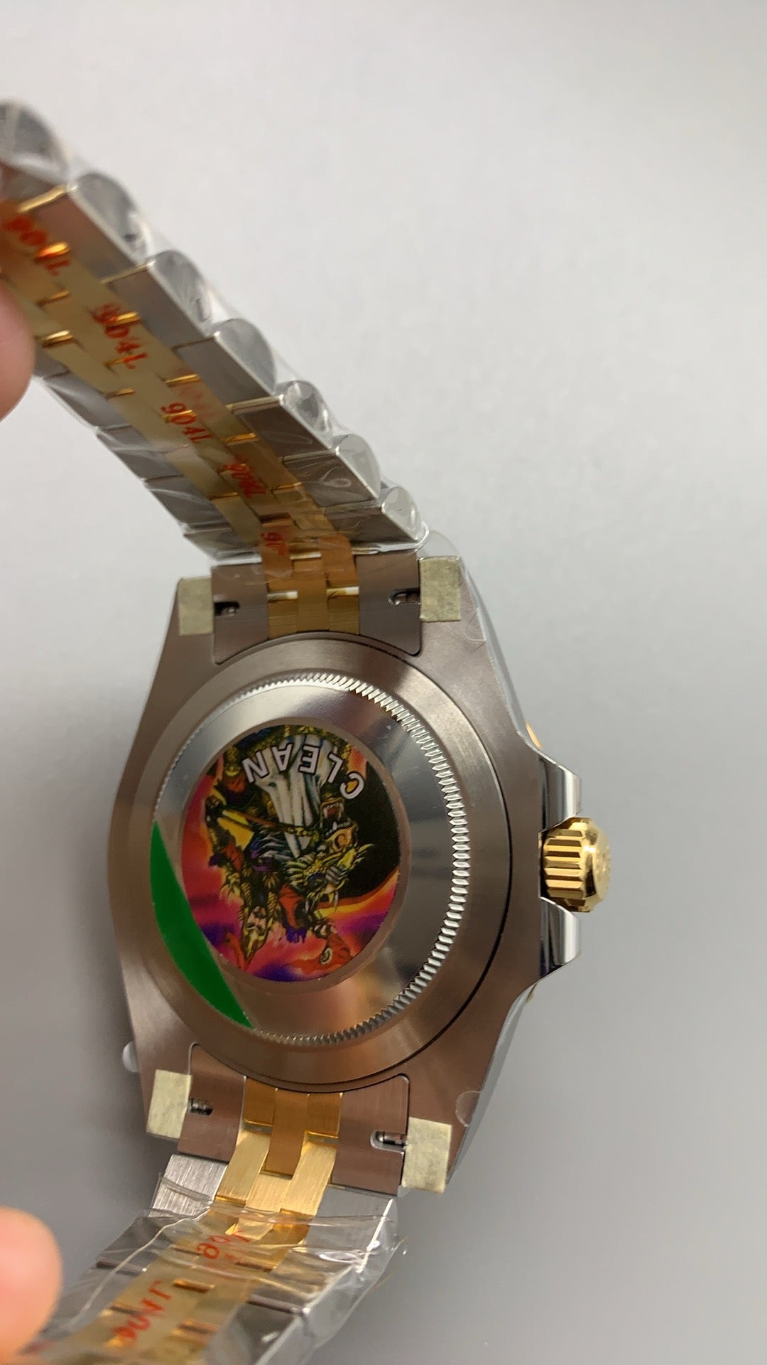 Rolex GMT-Master II 40MM | ขอบเซรามิกสีดำ-เทา (ขอบไข่เยี่ยวม้า) | ตัวเรือนสแตนเลสสลับเคลือบสีทอง PVD