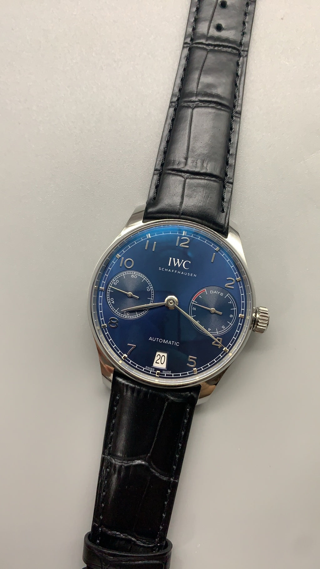 IWC Portugieser Automatic 7 Days | 42.3MM | ตัวเรือนสแตนเลสสตีล | พลังงานสำรอง 7 วัน | หน้าปัดสีน้ำเงิน | สายหนังจระเข้สีดำ | กลไกอัตโนมัติ Cal.52010