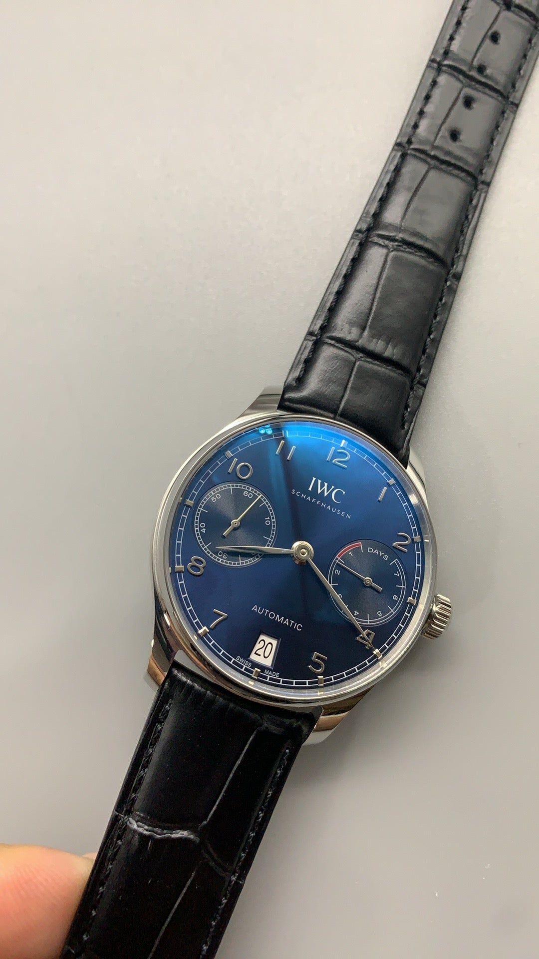 IWC Portugieser Automatic 7 Days | 42.3MM | ตัวเรือนสแตนเลสสตีล | พลังงานสำรอง 7 วัน | หน้าปัดสีน้ำเงิน | สายหนังจระเข้สีดำ | กลไกอัตโนมัติ Cal.52010