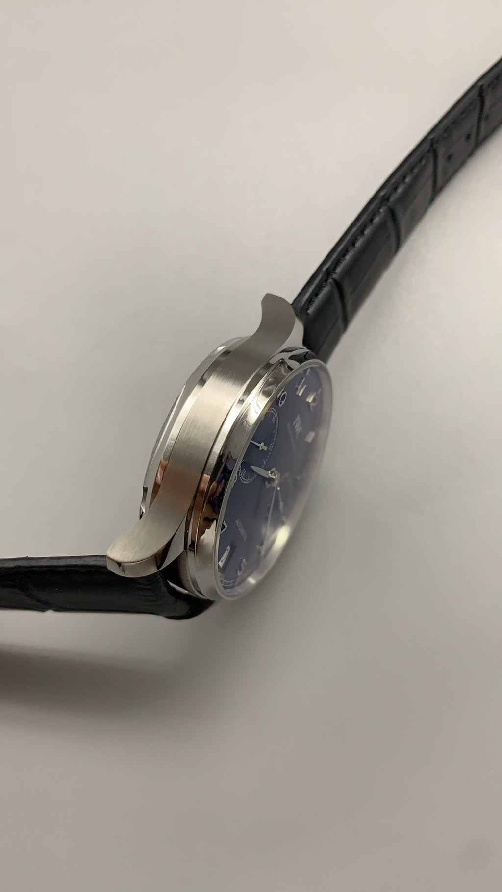 IWC Portugieser Automatic 7 Days | 42.3MM | ตัวเรือนสแตนเลสสตีล | พลังงานสำรอง 7 วัน | หน้าปัดสีน้ำเงิน | สายหนังจระเข้สีดำ | กลไกอัตโนมัติ Cal.52010